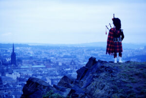 Scotland, Lothian, Edinburgh, piper above city (Enhancement)